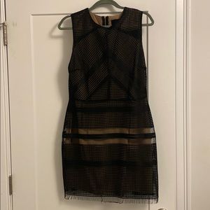 Black with tan liner cocktail dress.